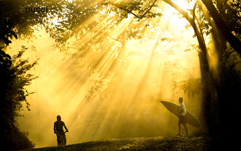 Costa-Rica-Happiest-surfer-bike-rider-sunrays-Pucci-Howler